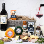 Cheese and Wine Gift Hamper Basket Set featuring artisan cheeses, chutneys, crackers, and a bottle of Old Gum Tree Shiraz, elegantly packed in a classic gift hamper basket—ideal for any occasion.