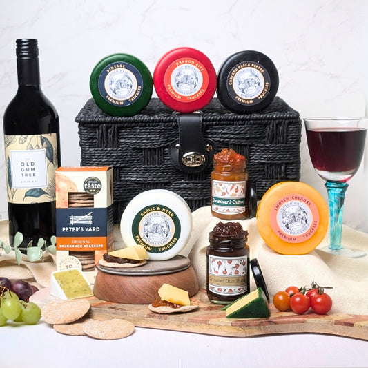 Luxury cheese and wine hamper featuring artisan cheeses, crackers, and The Old Gum Tree Shiraz (75cl), perfect for gifting